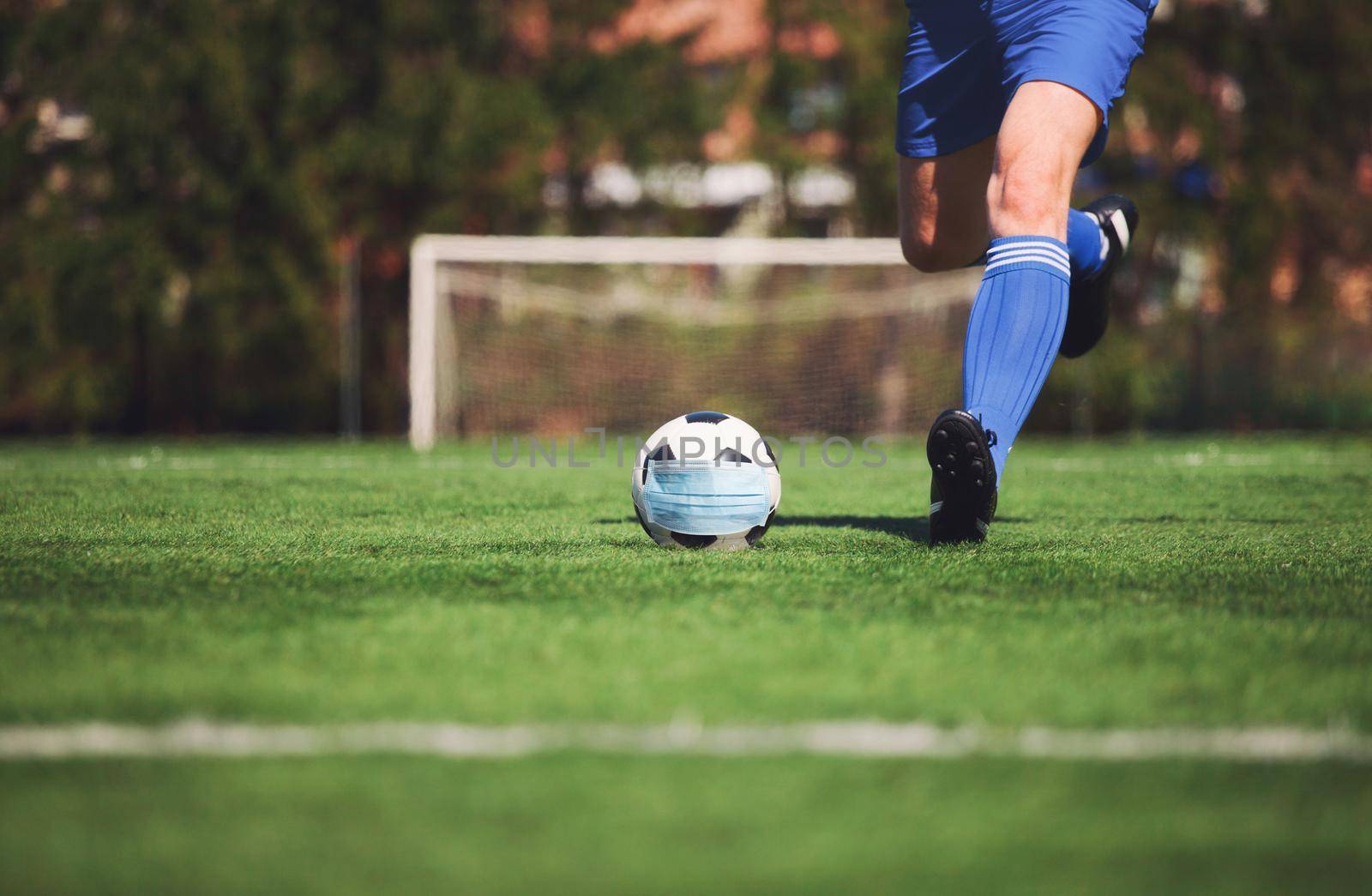Euro soccer cancellation event concept. Ball with coronavirus mask