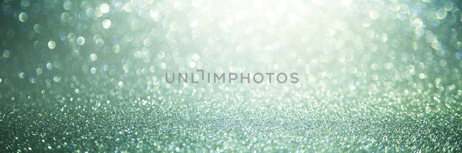 Sparkling lights, bokeh festive background with texture. by Taut