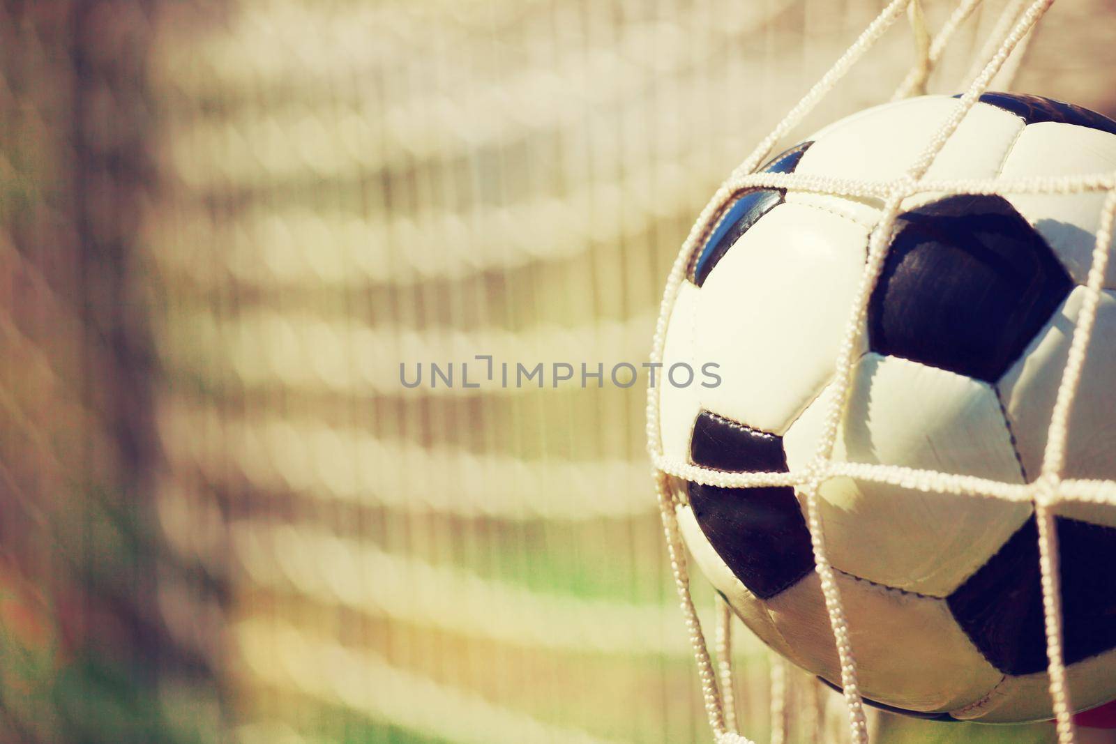 Traditional soccer game with a leather ball