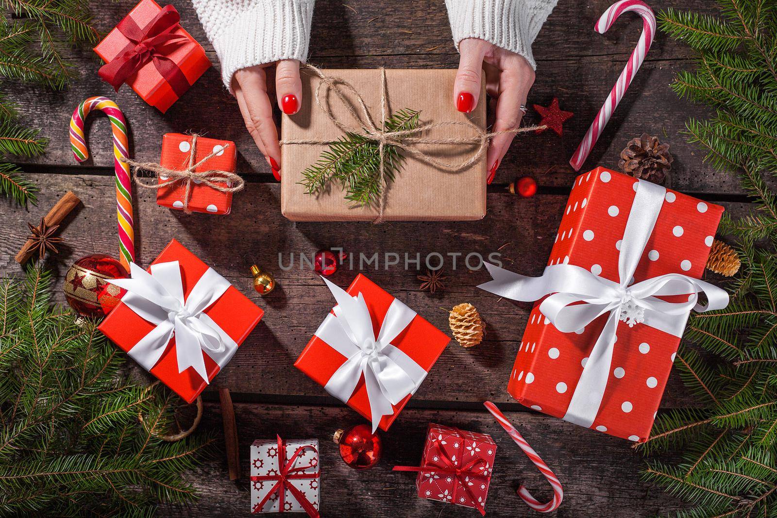 Gift box in craft wrapping paper with satin ribbon. Christmas, New year banner