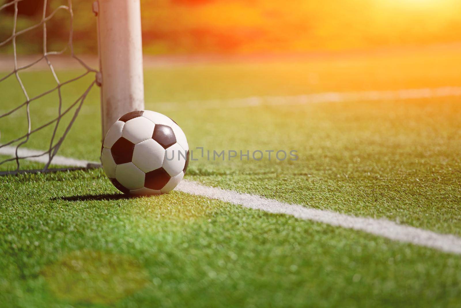 Traditional soccer game with a leather ball