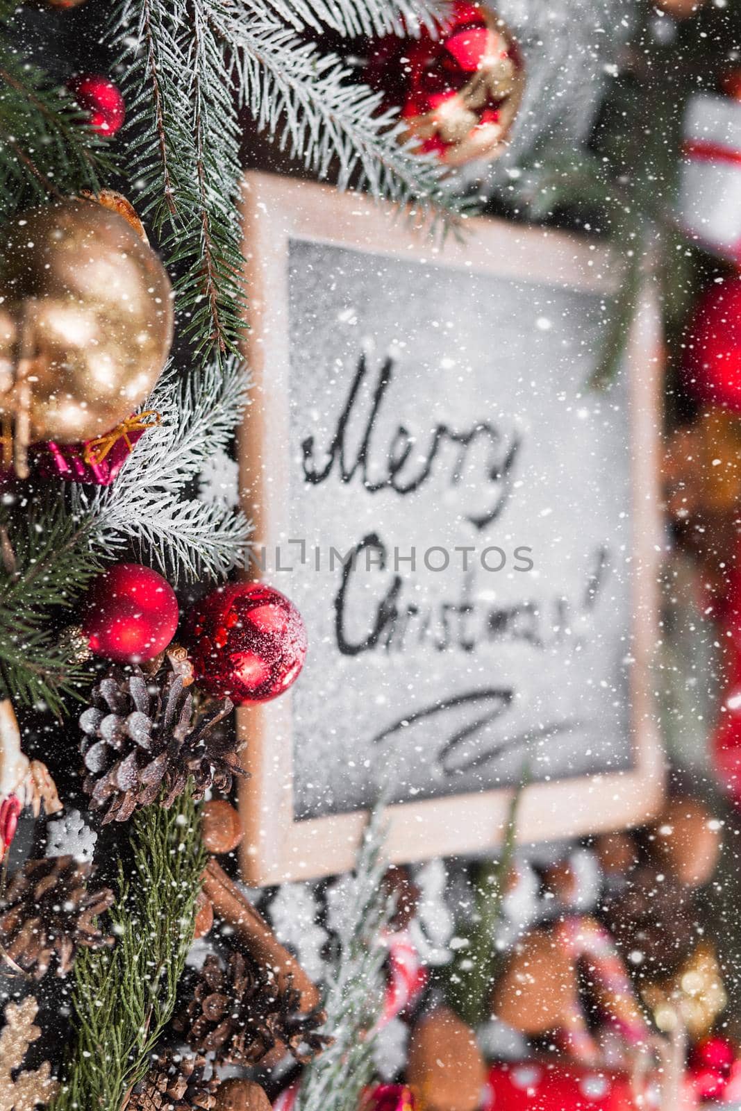Merry Christmas holiday background - black chalkboard in wooden frame by Taut