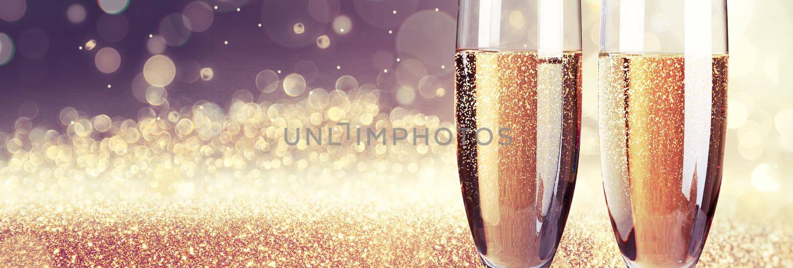 Glasses of champagne with splash, celebration theme concept