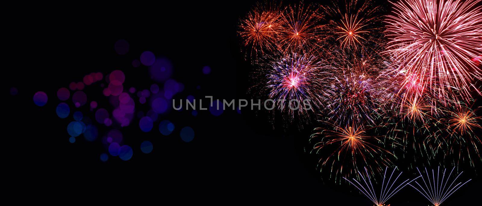 Abstract colored firework on dark sky. Celebration and anniversary concept by Taut