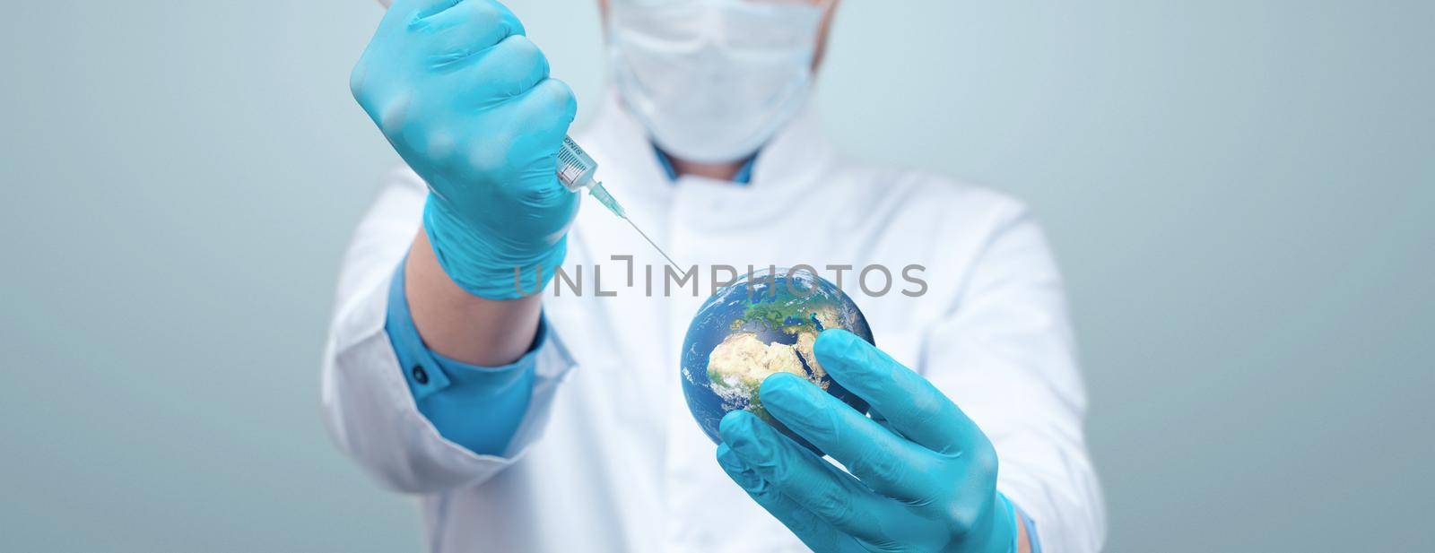 Doctor hold a earth globe in hands and a medical syringe with vaccine against corona virus. 3D rendering. Elements of this image furnished by NASA. by Taut