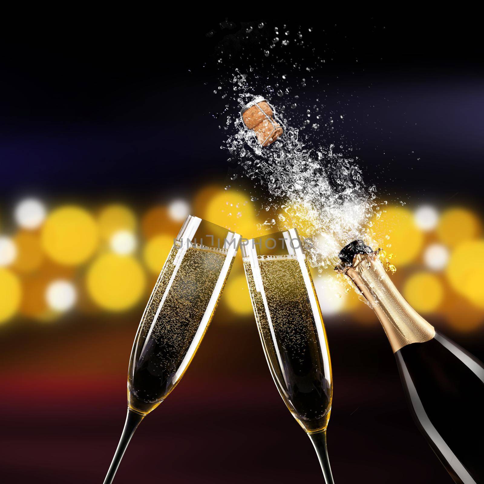 Glasses of champagne with splash, celebration theme concept