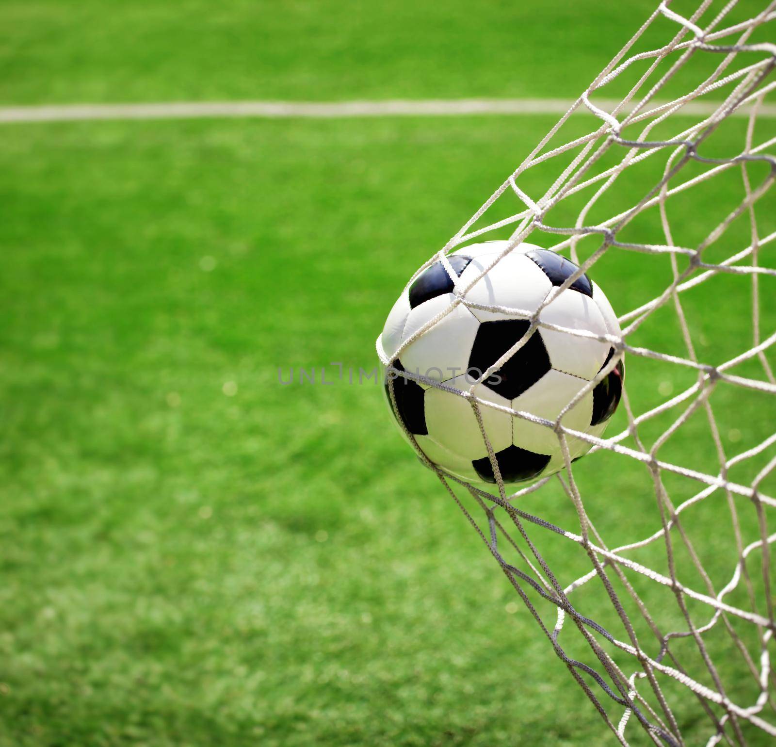 Traditional soccer game with a leather ball