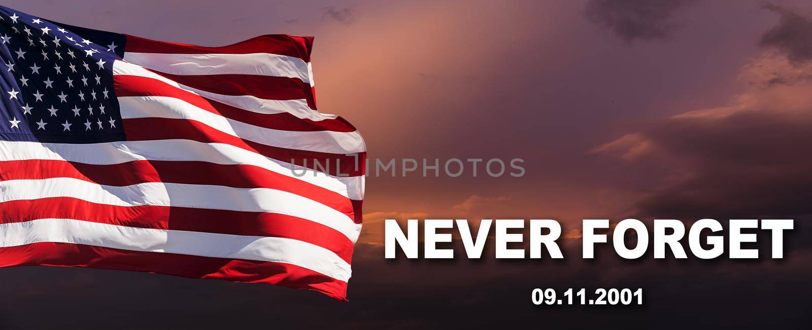 Patriot Day. We will newer forget September 11, 2001. American flag waving against a cloudy sky