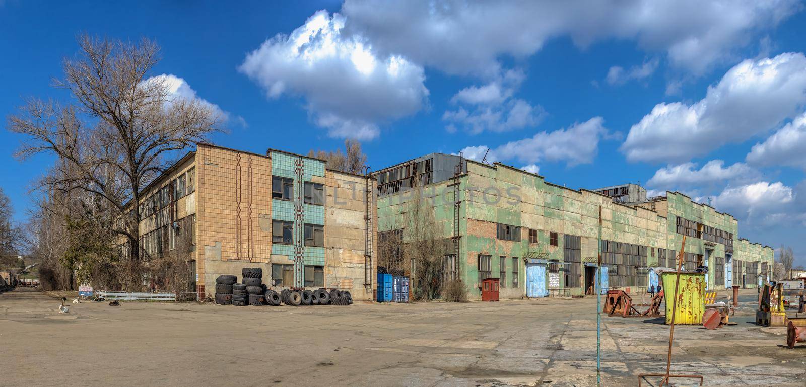 Chernomorsk, Ukraine. 21.03.2021. Factory workshops  of the Chernomorsk Shipyard on a sunny spring day