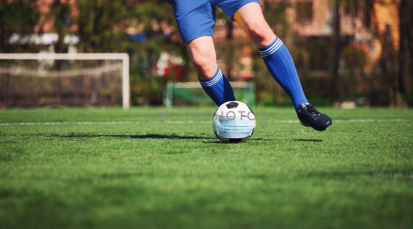 Euro soccer cancellation event concept. Ball with coronavirus mask