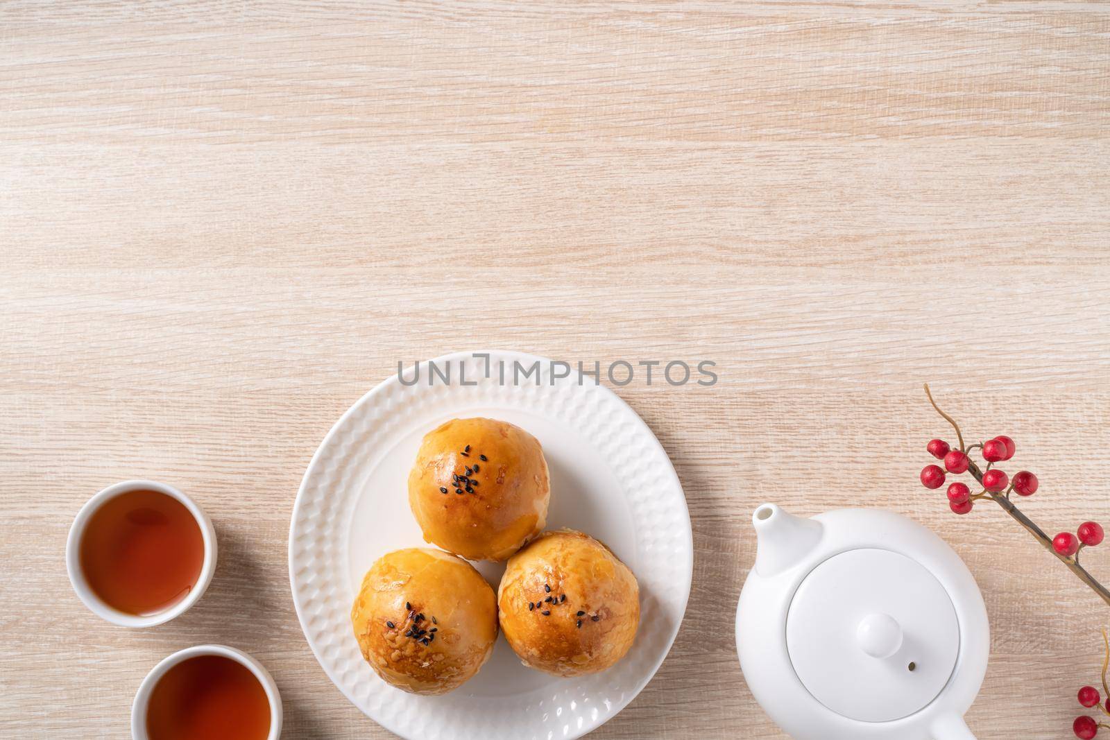 Top view design concept of Moon cake yolk pastry, mooncake for Mid-Autumn Festival holiday on wooden table background