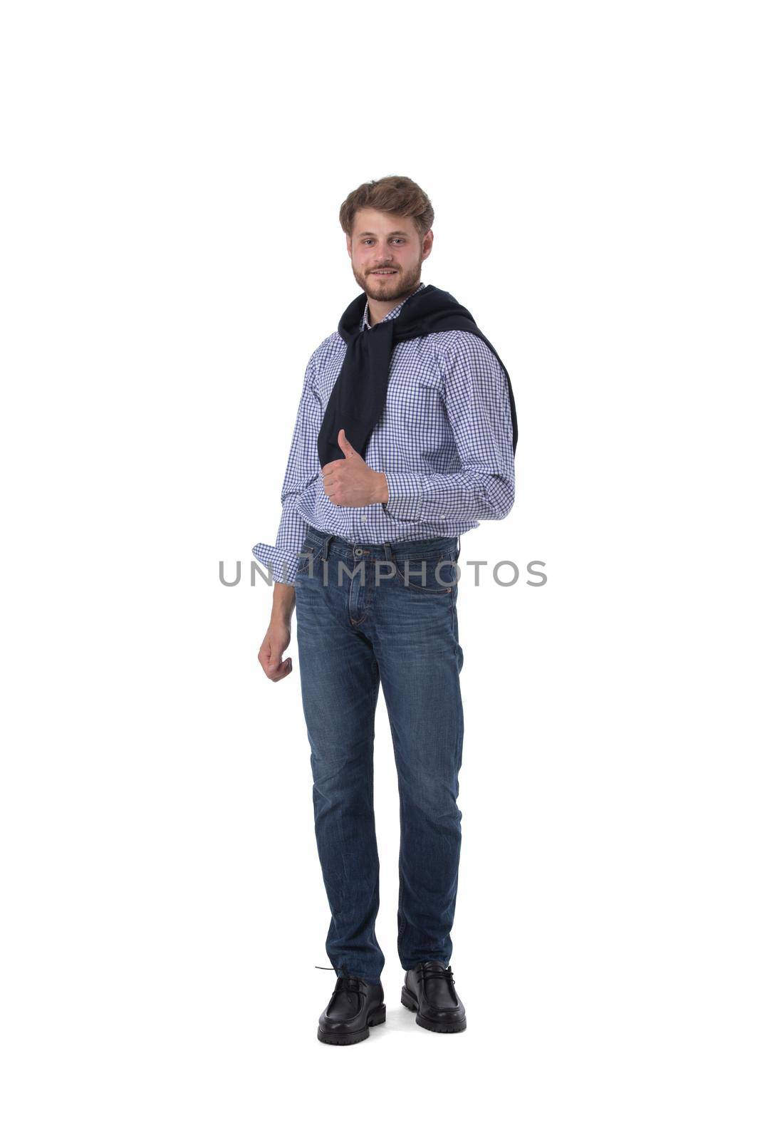 Full length portrait of young man showing thumb up isolated on white background