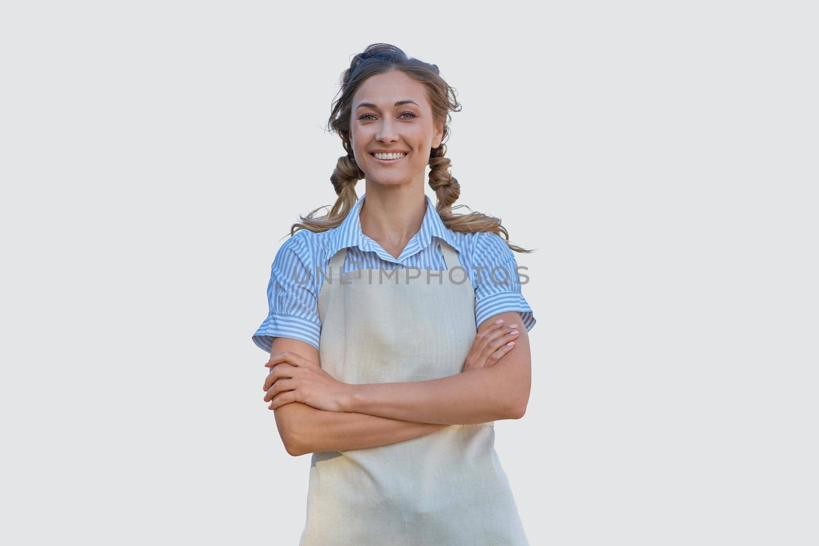 Woman dressed apron white background Caucasian middle age female business owner in uniform Happy one person smiling Time to advertise Small business