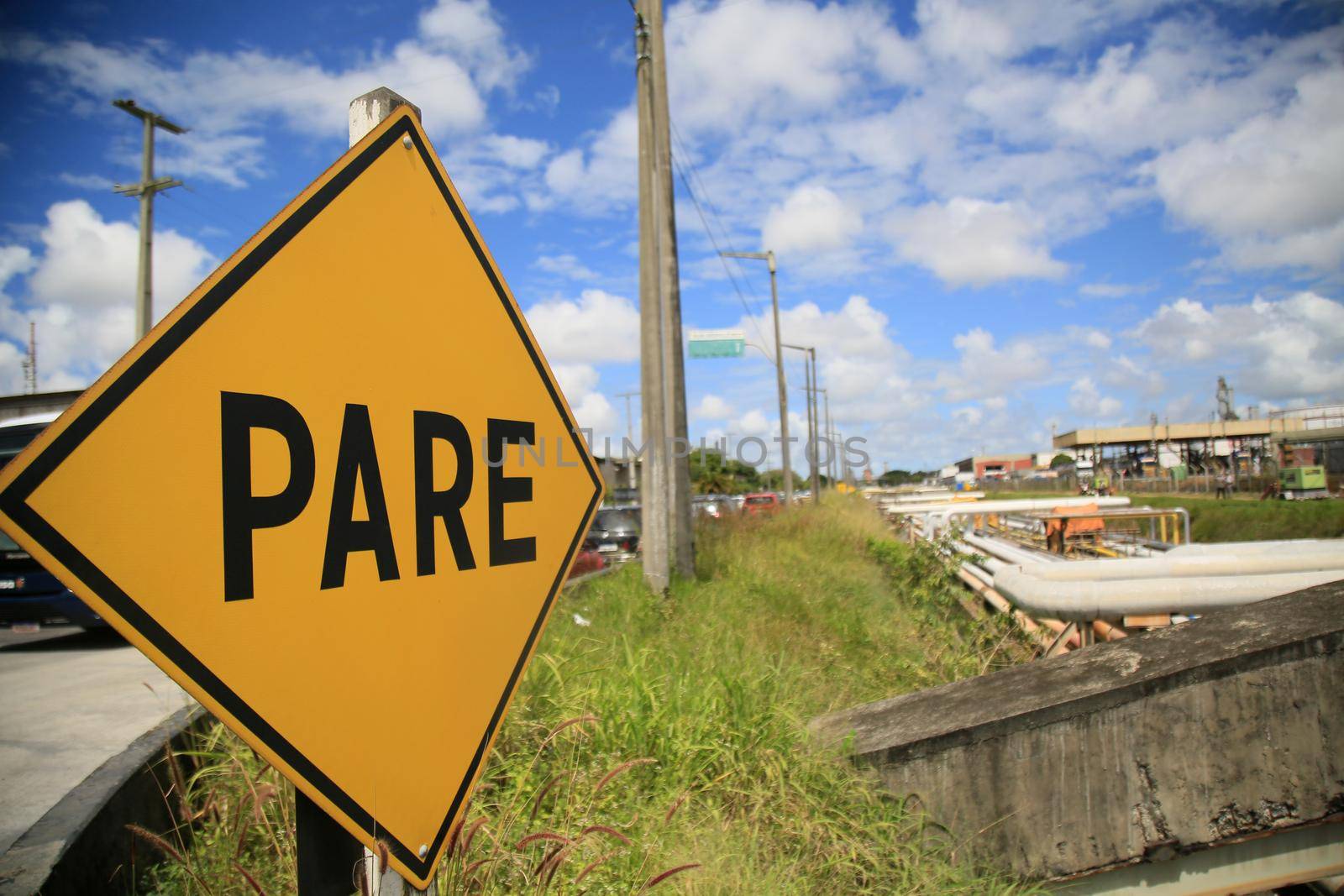 camacari, bahia, brazil - august 24, 2021: view of a traffic sign next to the Braskem company's factory in the industrial hub of the city of Camacari.
