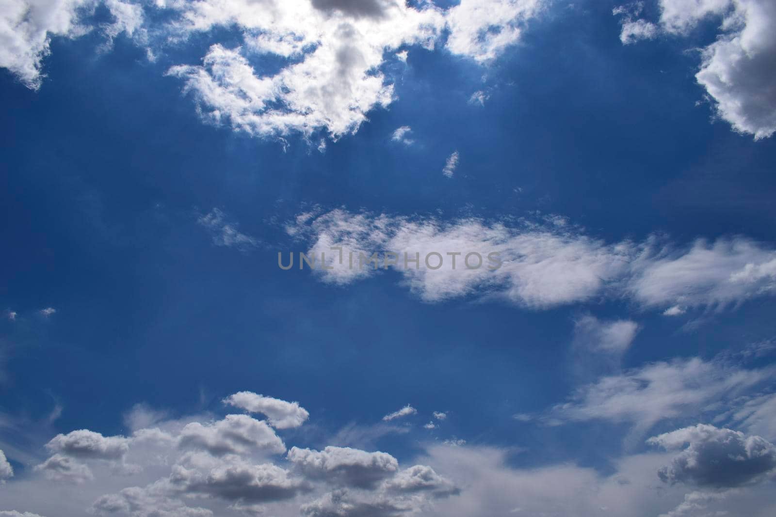 Beautiful blue sky with clouds background. Sky with clouds weather nature clouds and blue sky with sun. Aerial sky and clouds background.