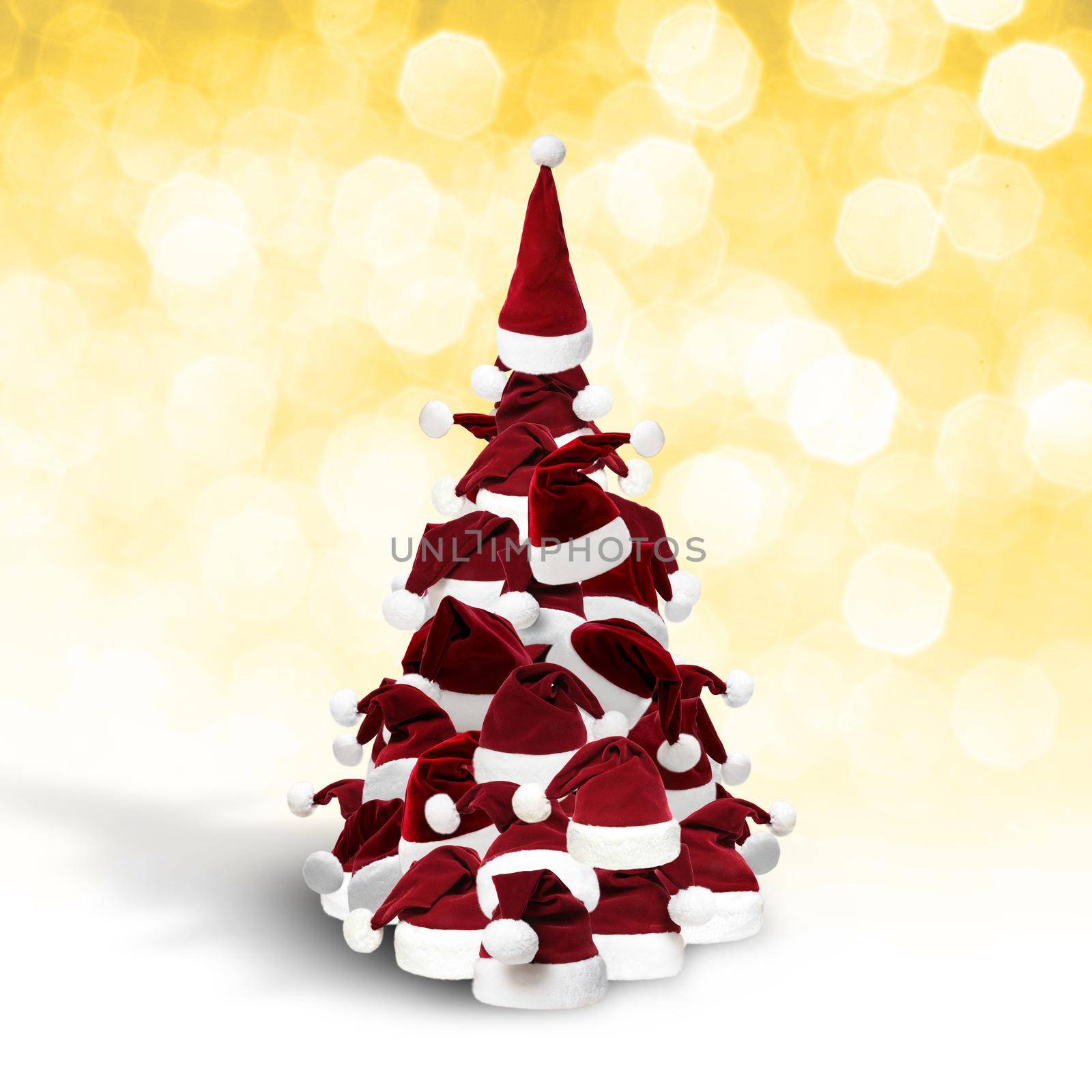 Merry Christmas concept with christmas tree and christmas hats by Taut
