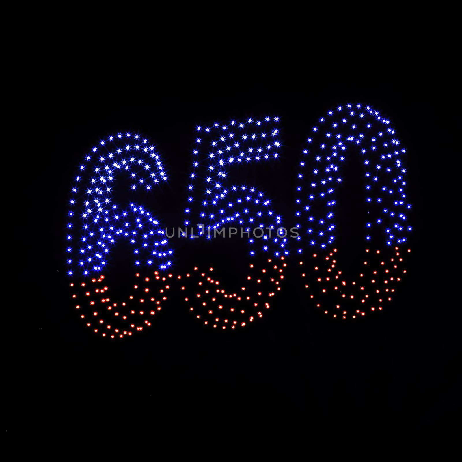 Colorful drone light shows on a night sky background. A figure of the number 650 made of glowing drones. by Eugene_Yemelyanov