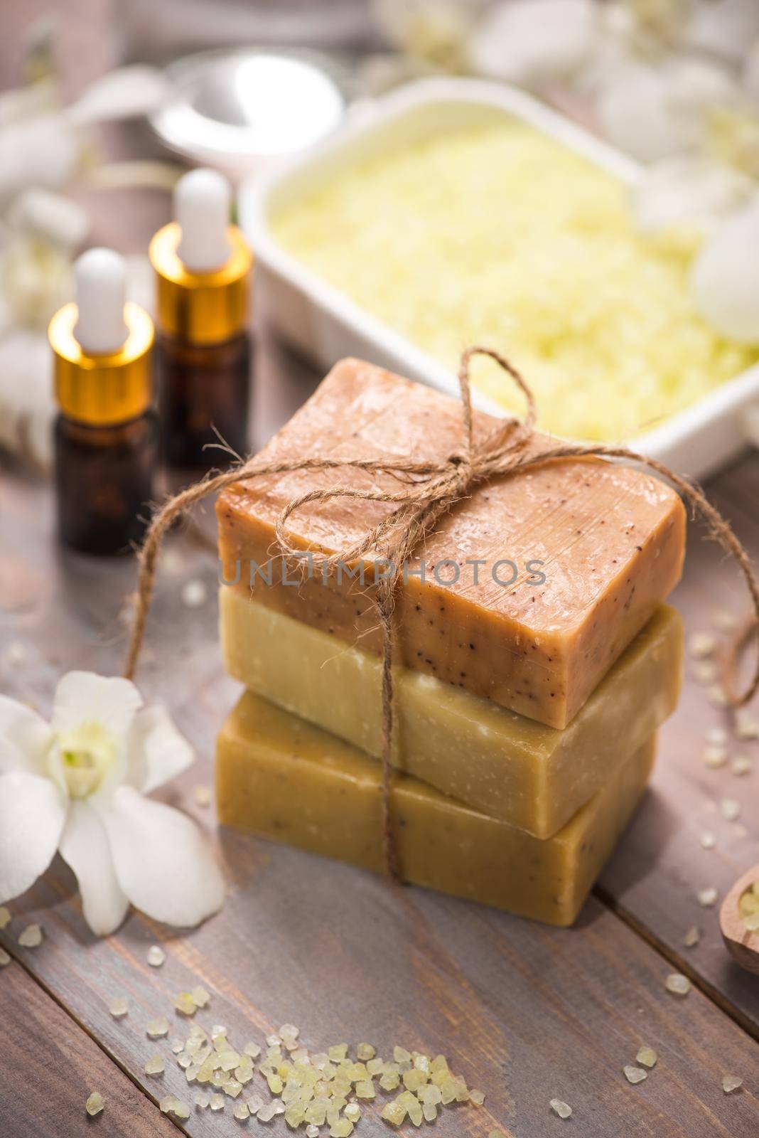 Handmade Soap and Aroma Oil with Flower branch. Spa products.