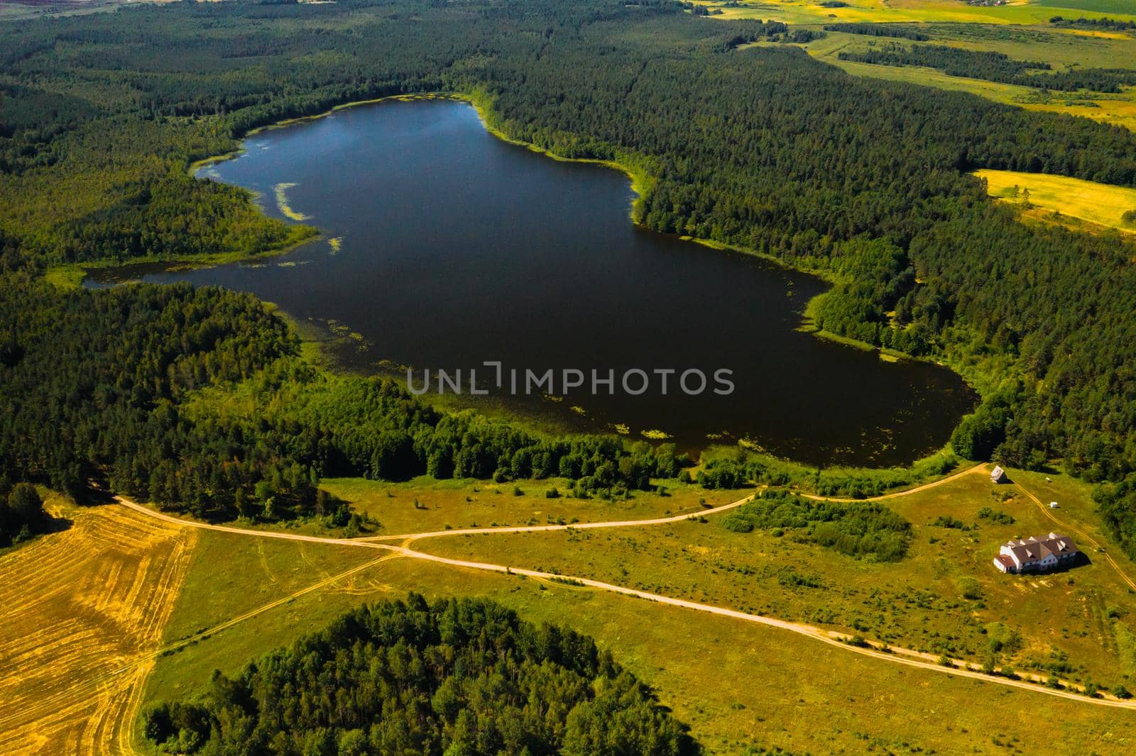 Top view of the lake Bolta in the forest in the Braslav lakes National Park, the most beautiful places in Belarus.An island in the lake.Belarus. by Lobachad