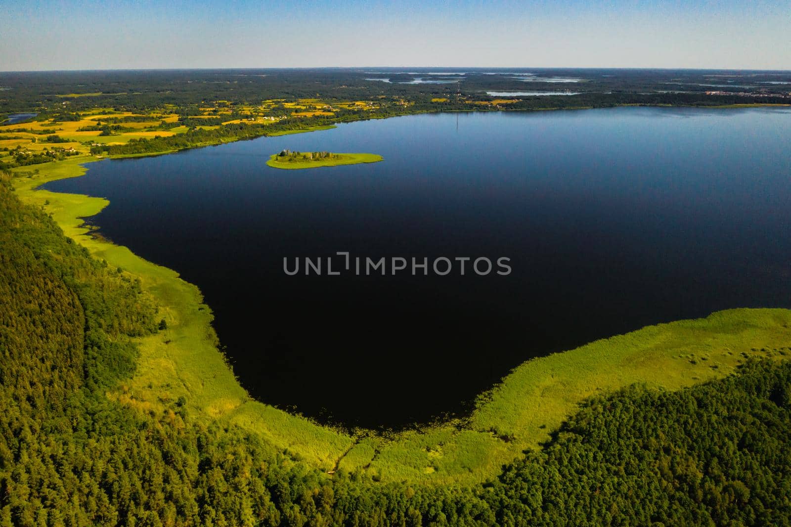 Top view of lake Drivyaty in the Braslav lakes National Park, the most beautiful lakes in Belarus.An island in the lake.Belarus. by Lobachad