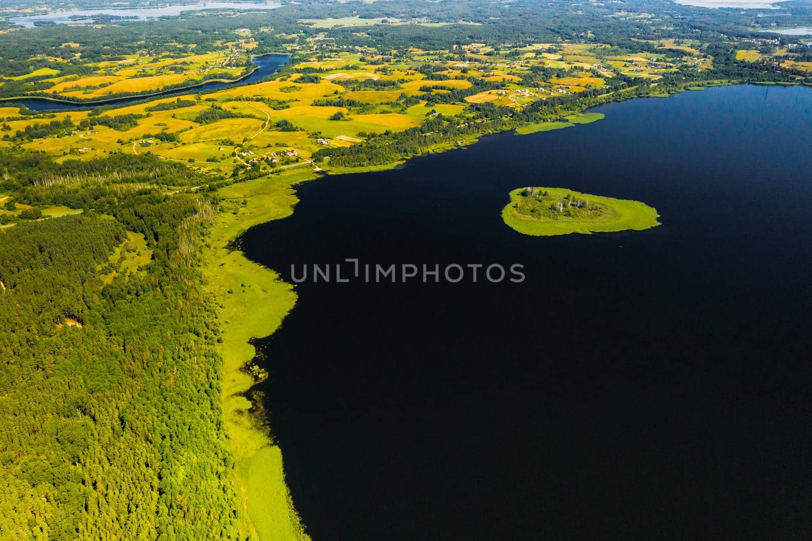 Top view of lake Drivyaty in the Braslav lakes National Park, the most beautiful lakes in Belarus.An island in the lake.Belarus. by Lobachad