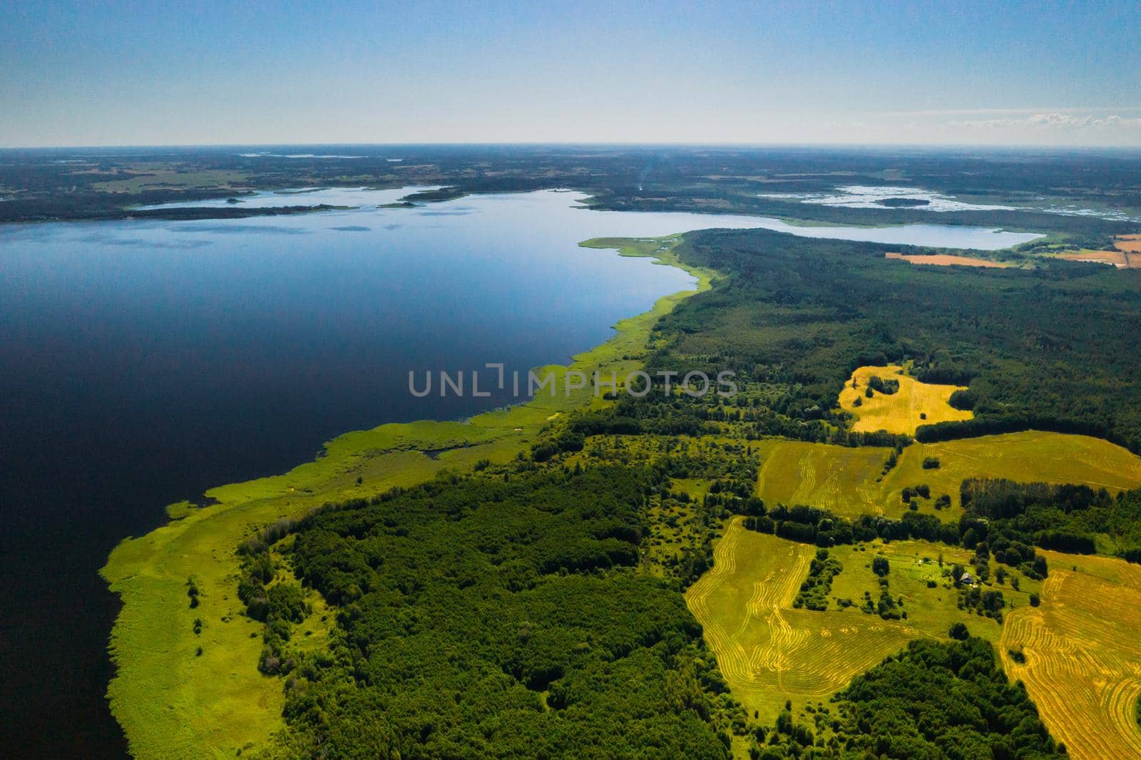 Top view of lake Drivyaty in the Braslav lakes National Park, the most beautiful lakes in Belarus.An island in the lake.Belarus. by Lobachad