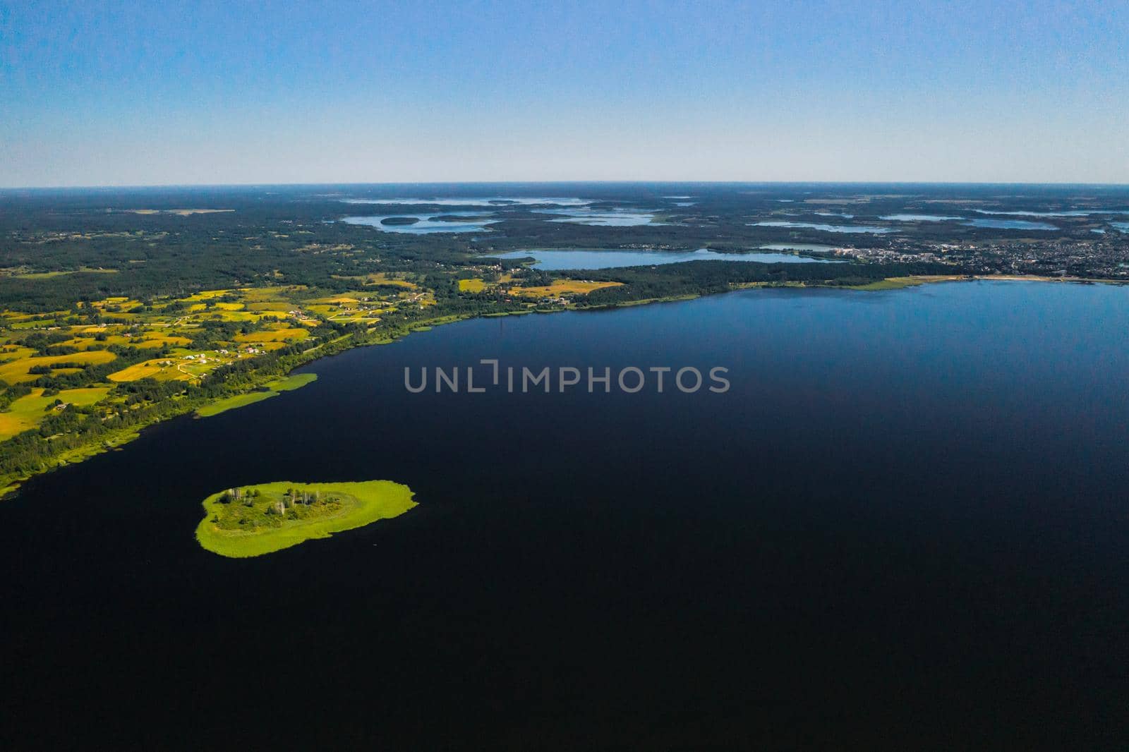 Top view of lake Drivyaty in the Braslav lakes National Park, the most beautiful lakes in Belarus.An island in the lake.Belarus. by Lobachad