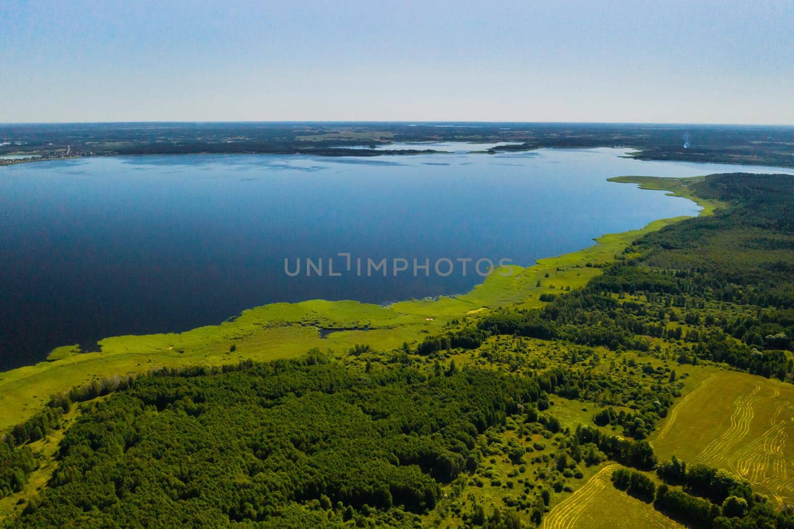 Top view of lake Drivyaty in the Braslav lakes National Park, the most beautiful lakes in Belarus.An island in the lake.Belarus. by Lobachad