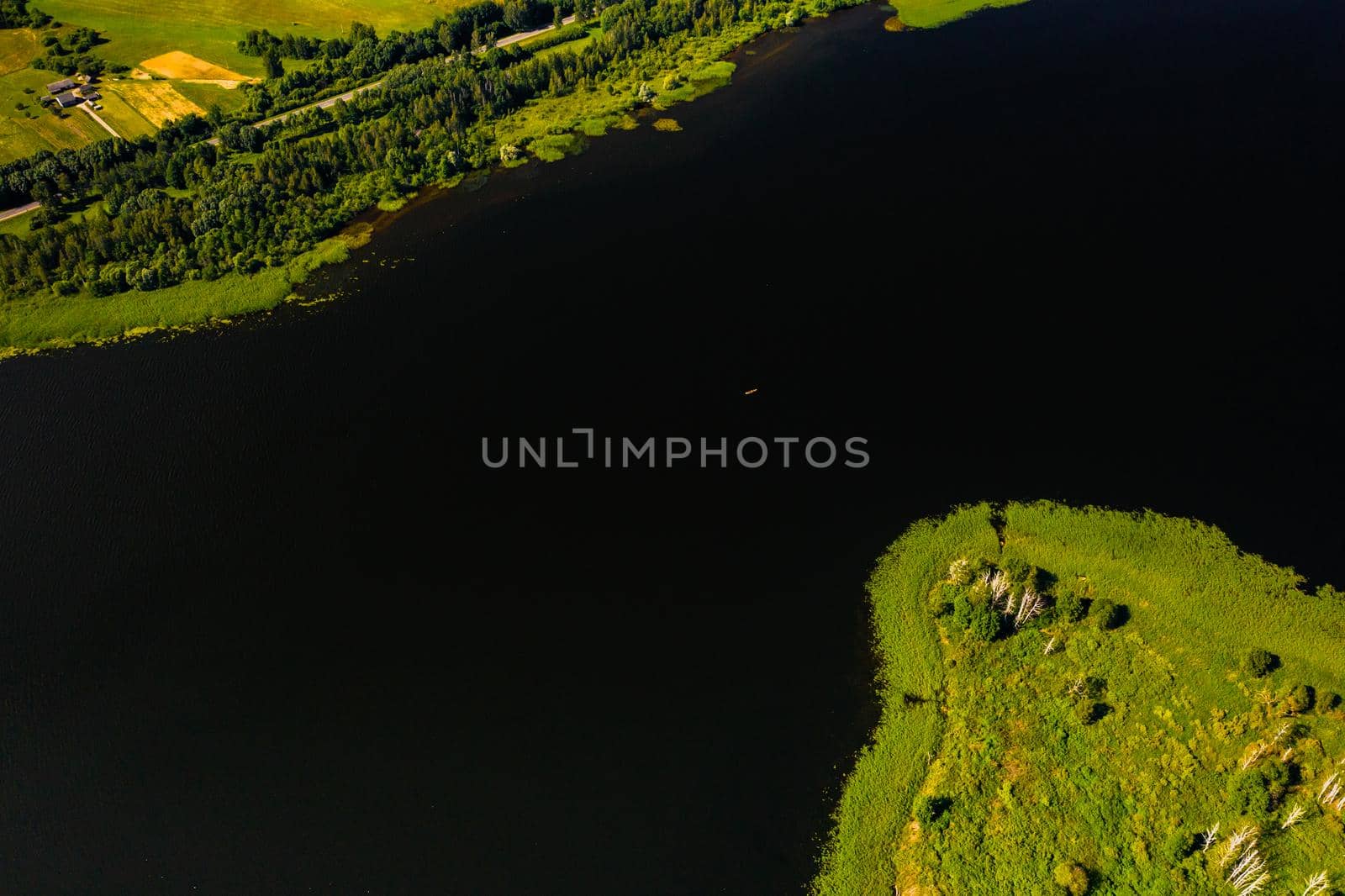 Top view of lake Drivyaty in the Braslav lakes National Park, the most beautiful lakes in Belarus.An island in the lake.Belarus. by Lobachad