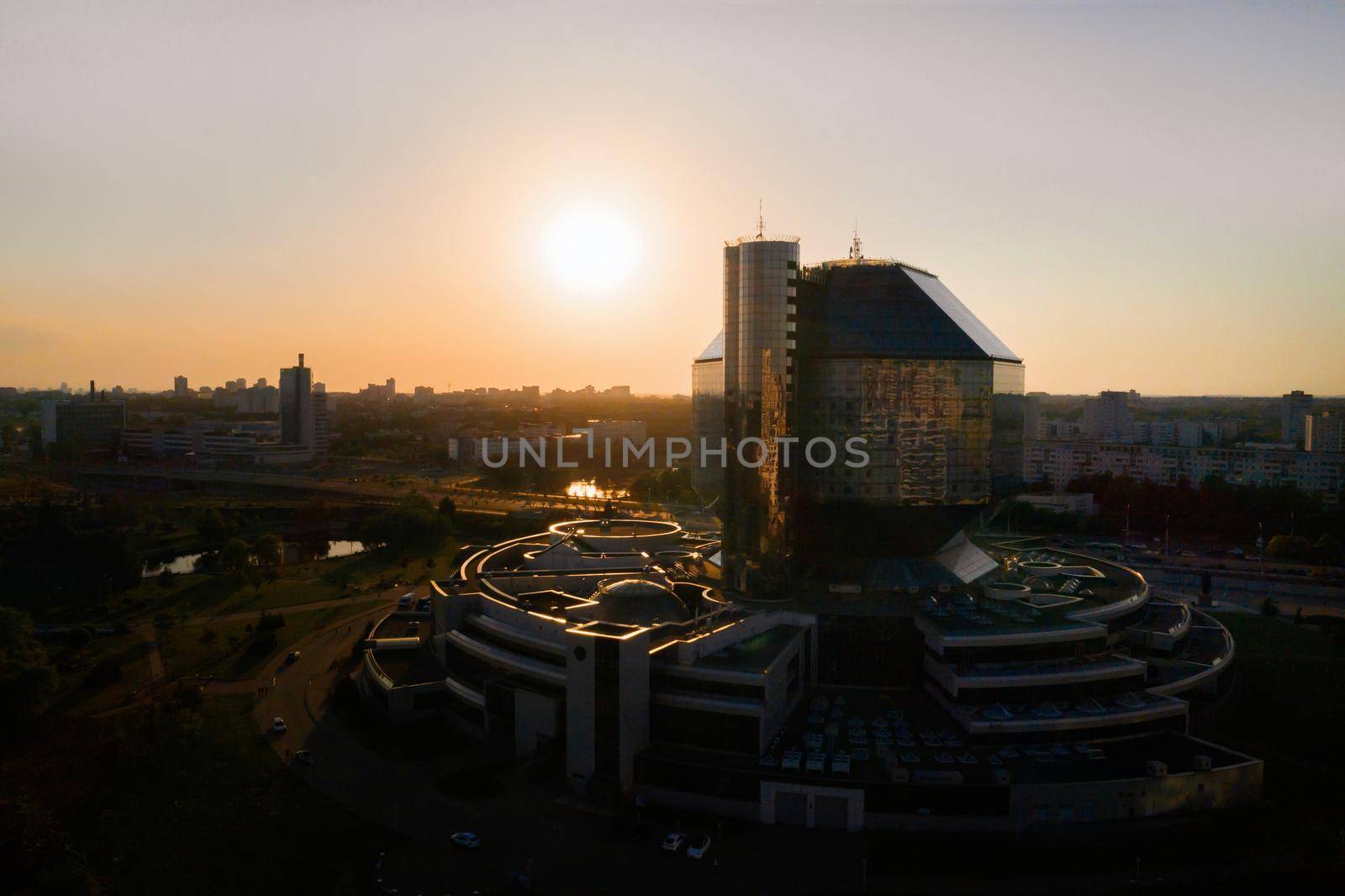 Top view of the National library and a new neighborhood with a Park in Minsk-the capital of the Republic of Belarus at sunset, a public building.