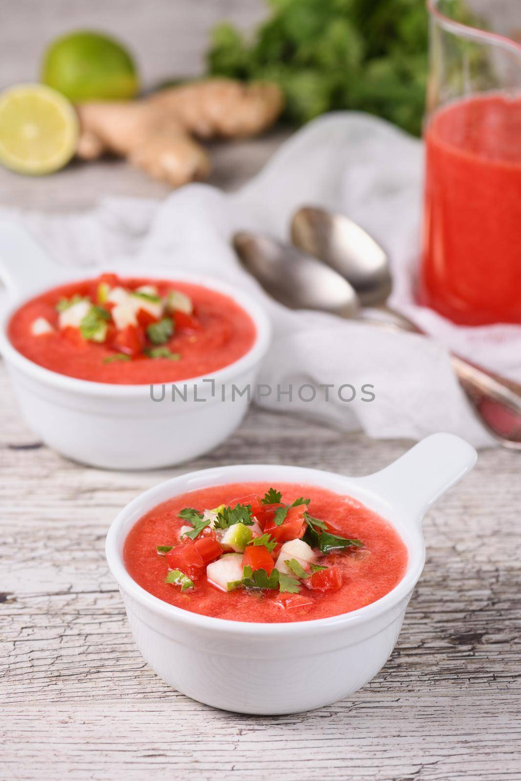 Watermelon tomato gazpacho in bowls by Apolonia