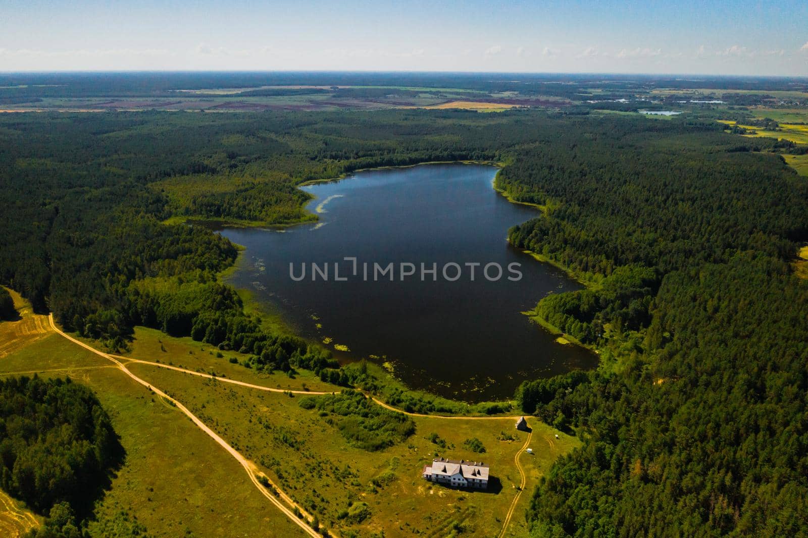 Top view of the lake Bolta in the forest in the Braslav lakes National Park, the most beautiful places in Belarus.An island in the lake.Belarus