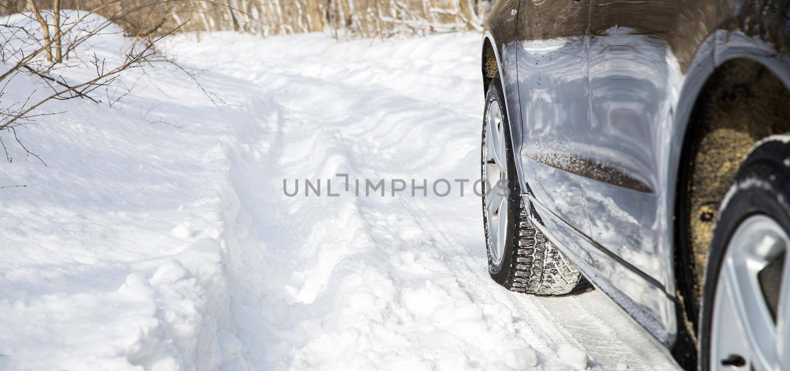 Driving car in winter with much snow by Mariakray