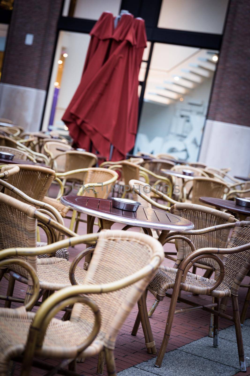 Small cafe tables outside on a street