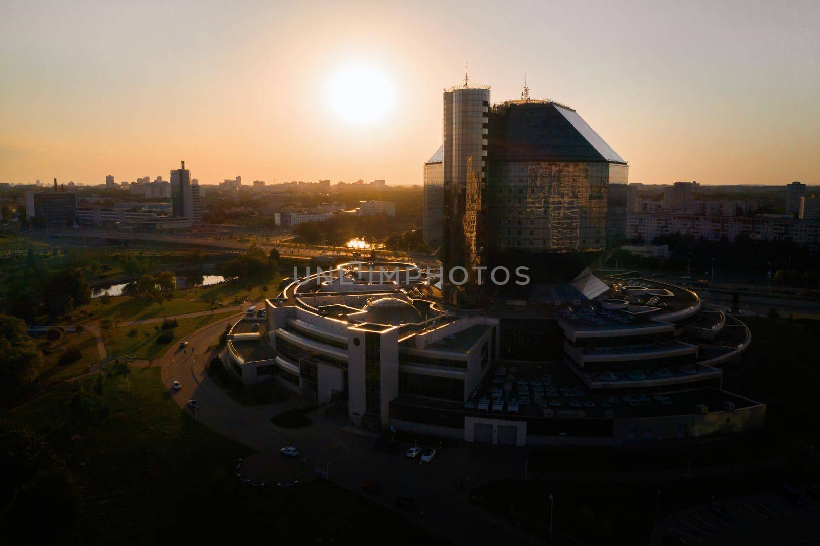 Top view of the National library and a new neighborhood with a Park in Minsk-the capital of the Republic of Belarus at sunset, a public building.