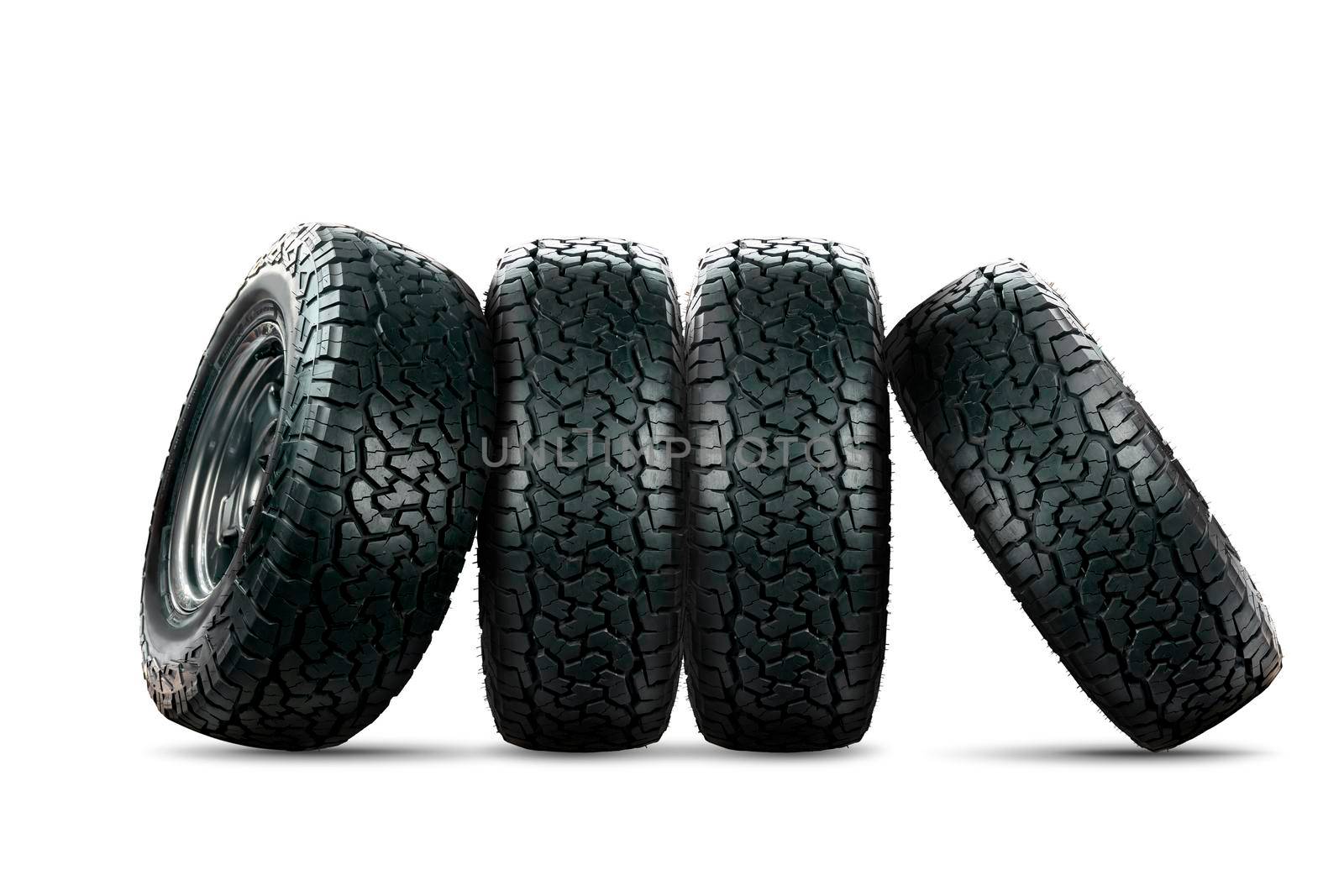 Set of 4 wheels car tires designed for use in all road conditions isolated on white background. by wattanaphob