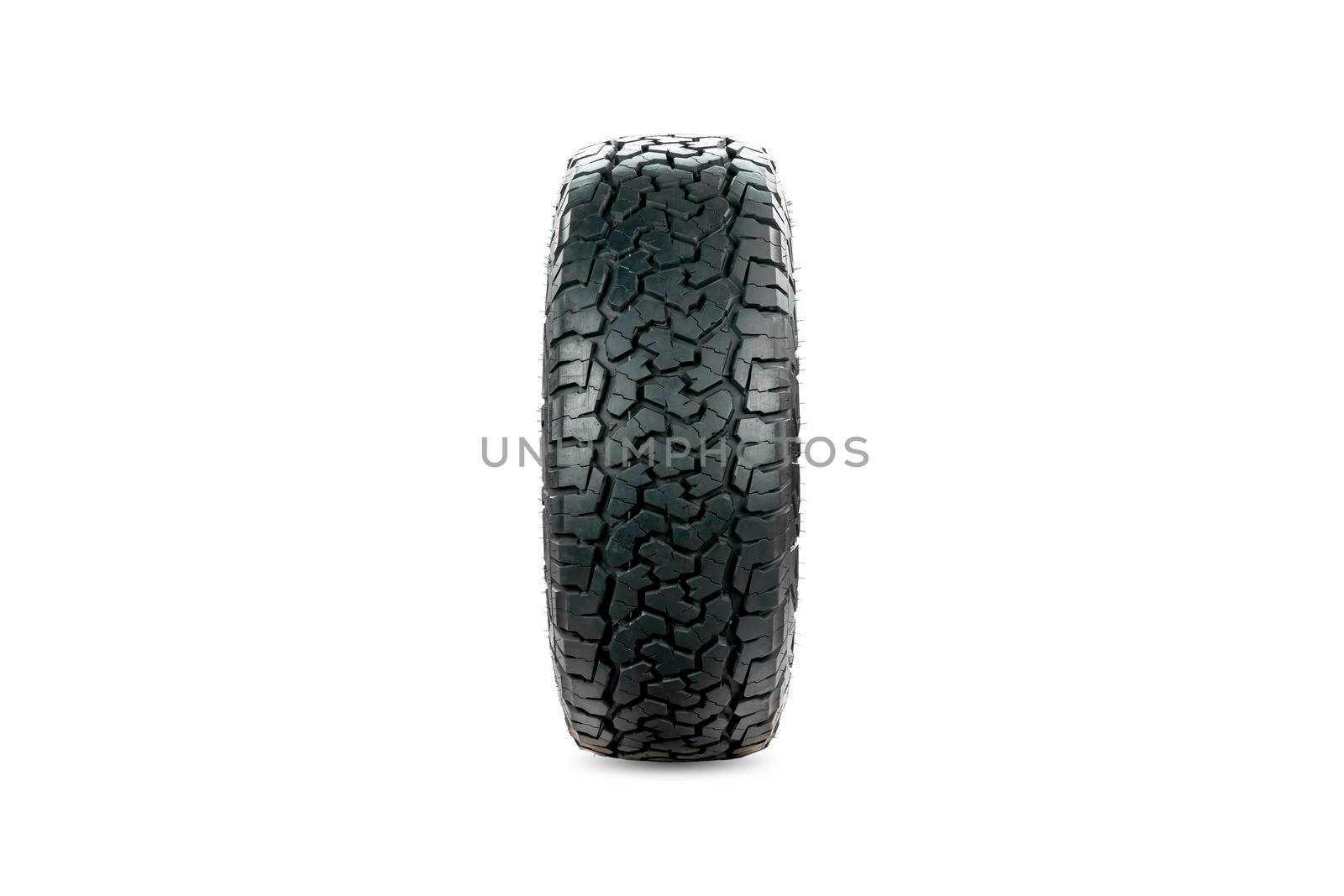 Front view of an all terrain tire designed for use in all road conditions isolated on white background.