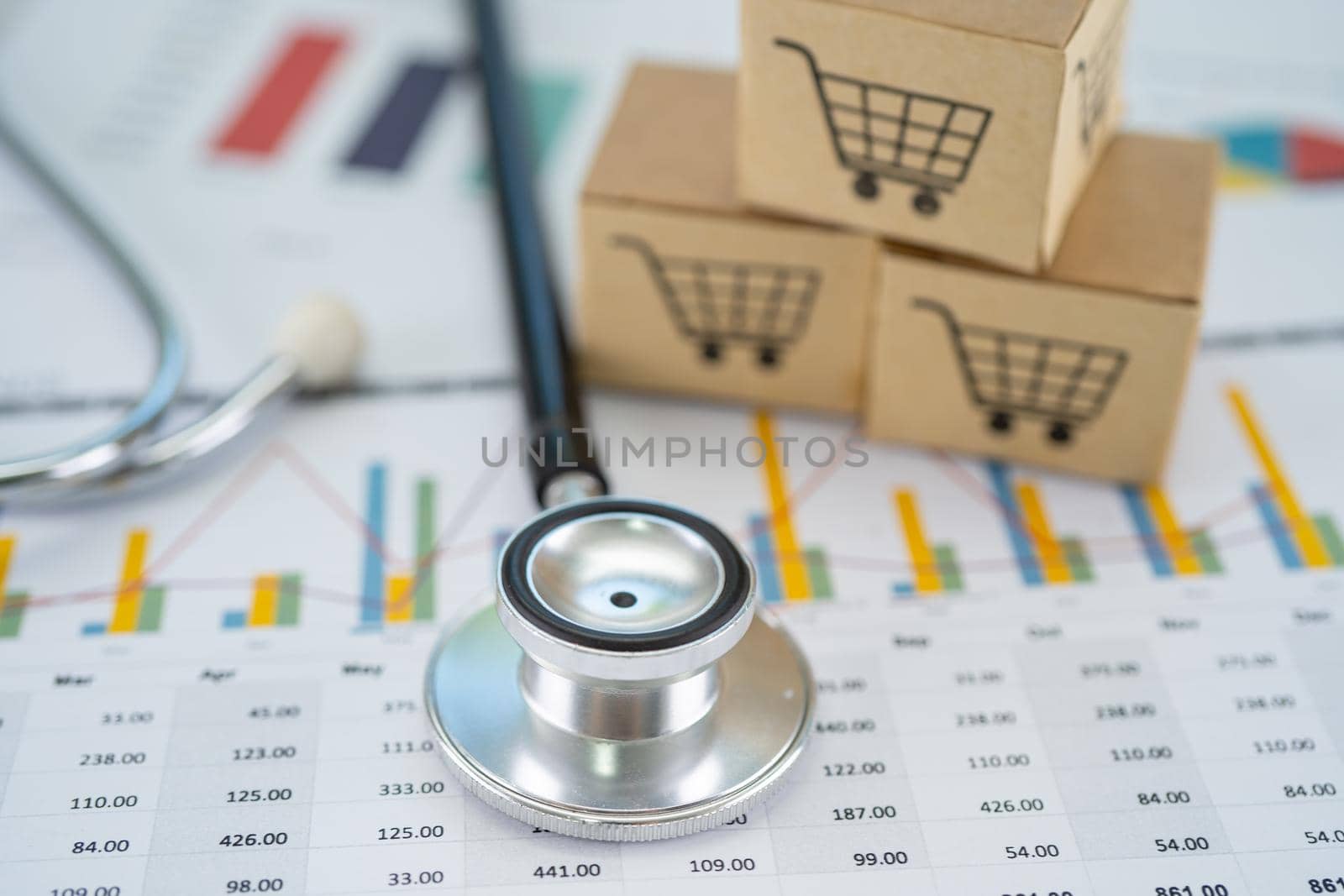 Stethoscope and shopping cart logo on box with graph background. Banking Account, Investment Analytic research data economy, trading, Business import export transportation online company concept. by pamai