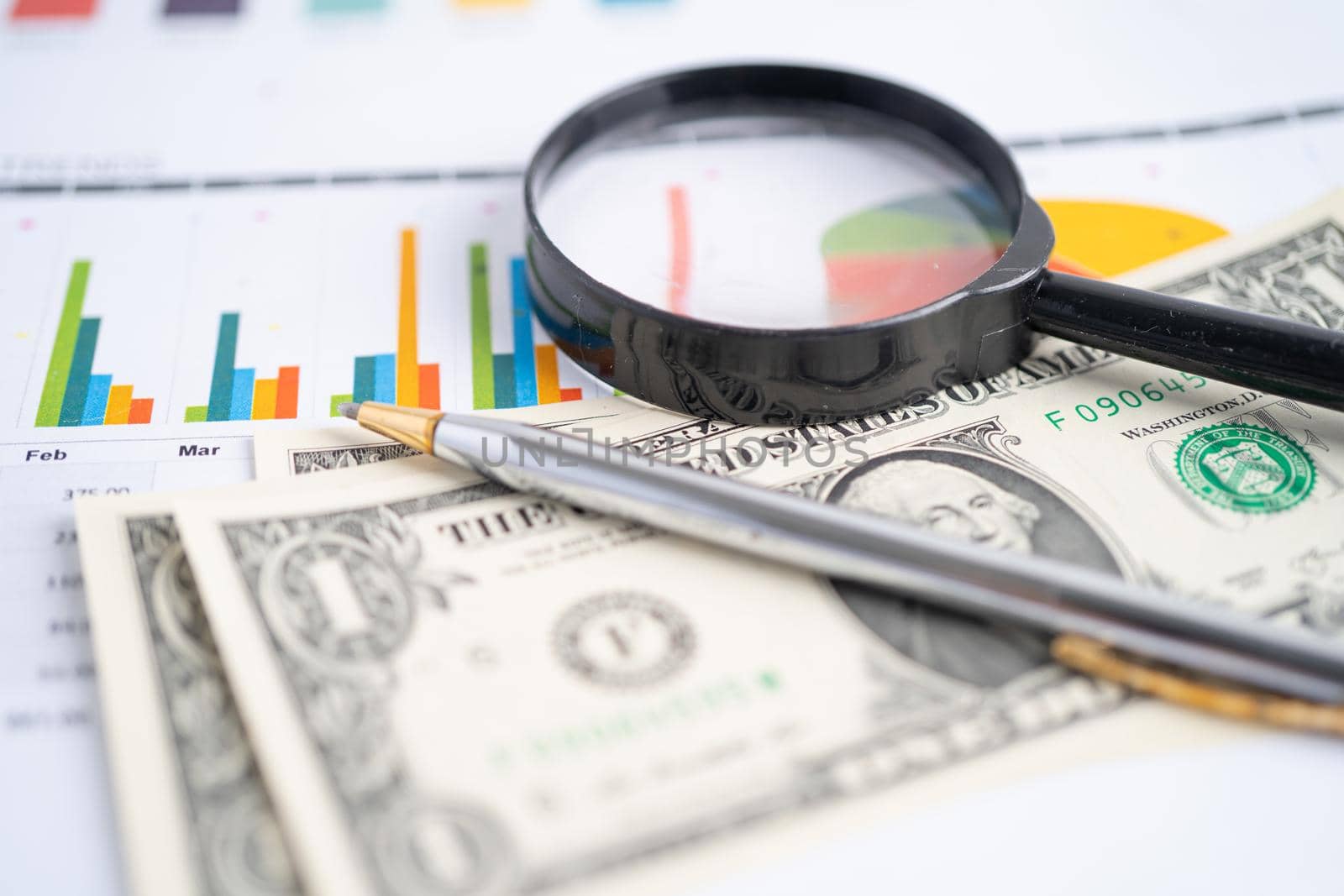 Magnifying glass on charts graphs paper. Financial development, Banking Account, Statistics, Investment Analytic research data economy, Stock exchange trading, Business office company meeting concept.