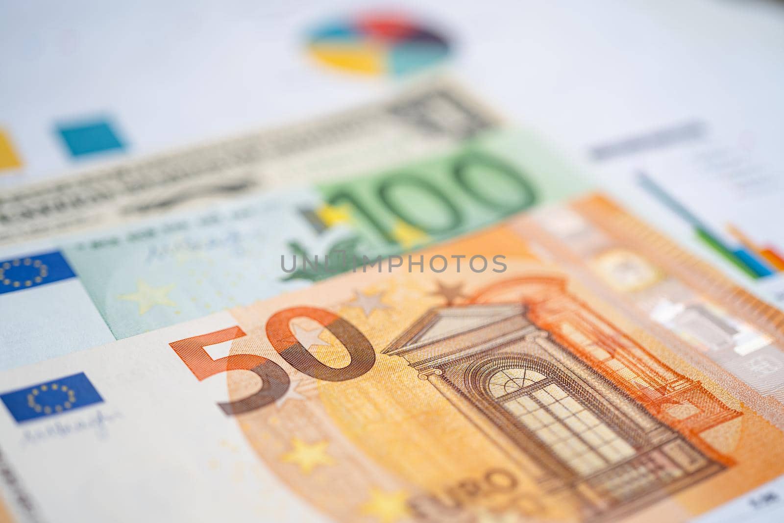 Euro banknotes money on chart graph paper. Financial development, Banking Account, Statistics, Investment Analytic research data economy, trading, Business company concept. by pamai