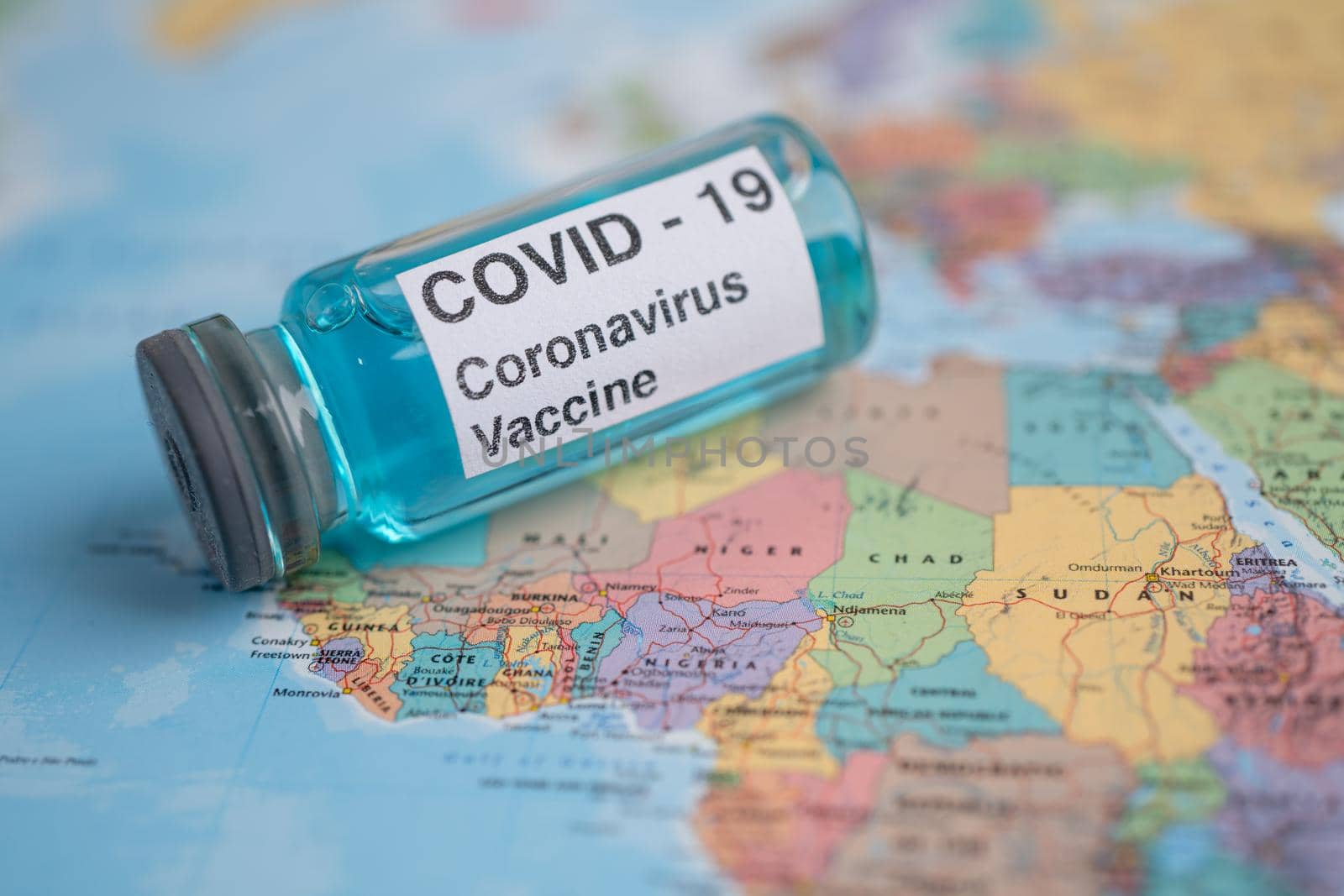 Bangkok, Thailand - July 1, 2021, Coronavirus Covid-19 vaccine on Africa map, development medical for doctor use to treat pneumonia illness patients. by pamai