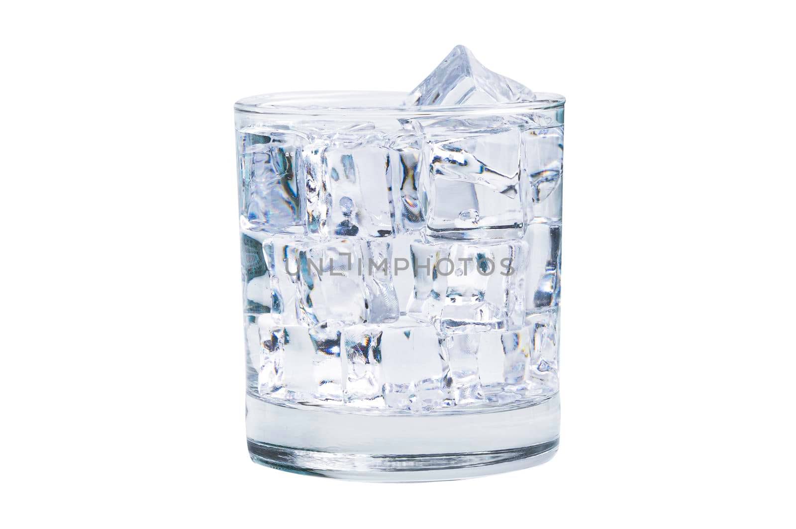 Glass of ice cubes cold fresh water for drink in summer isolated on white background with clipping path.