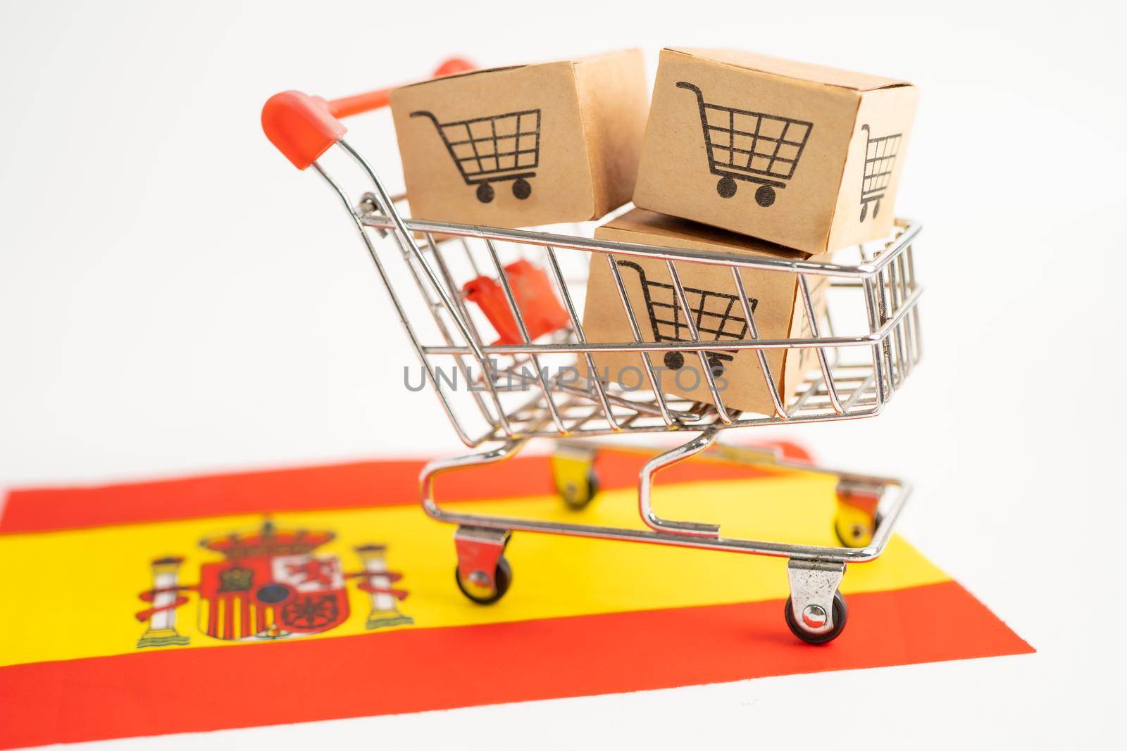 Box with shopping cart logo and Spain flag, Import Export Shopping online or eCommerce finance delivery service store product shipping, trade, supplier concept. by pamai