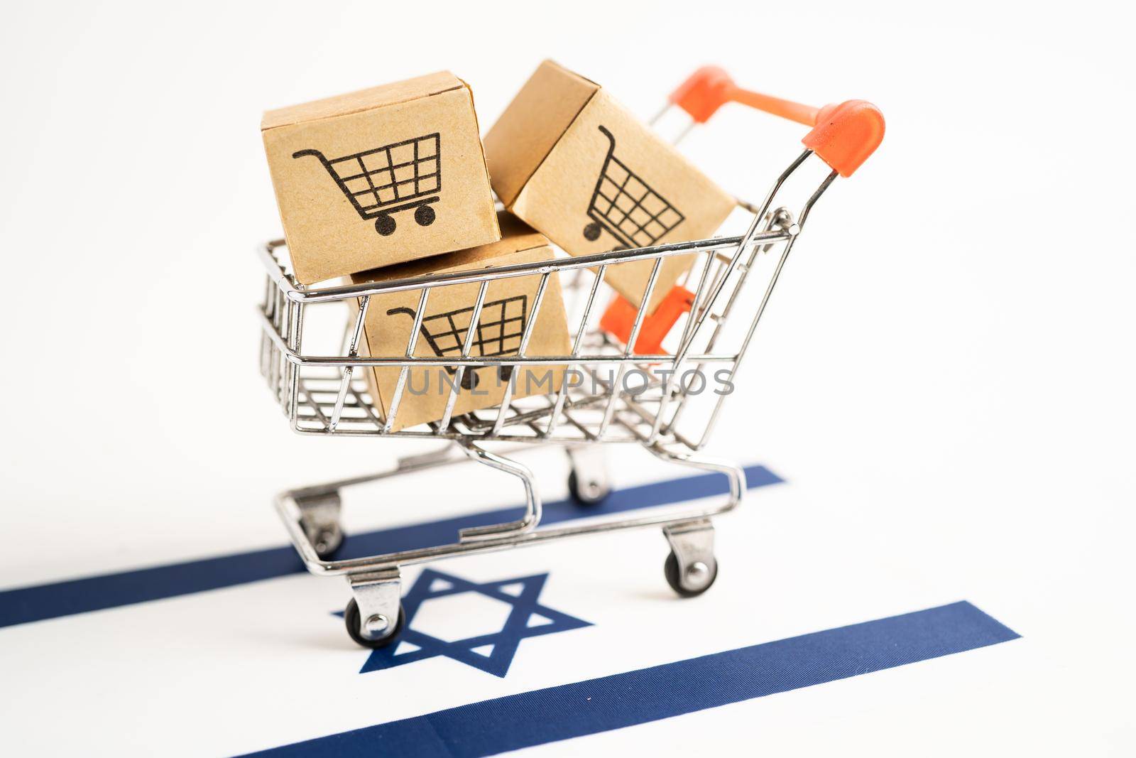 Box with shopping cart logo and Israel flag, Import Export Shopping online or eCommerce finance delivery service store product shipping, trade, supplier concept. by pamai