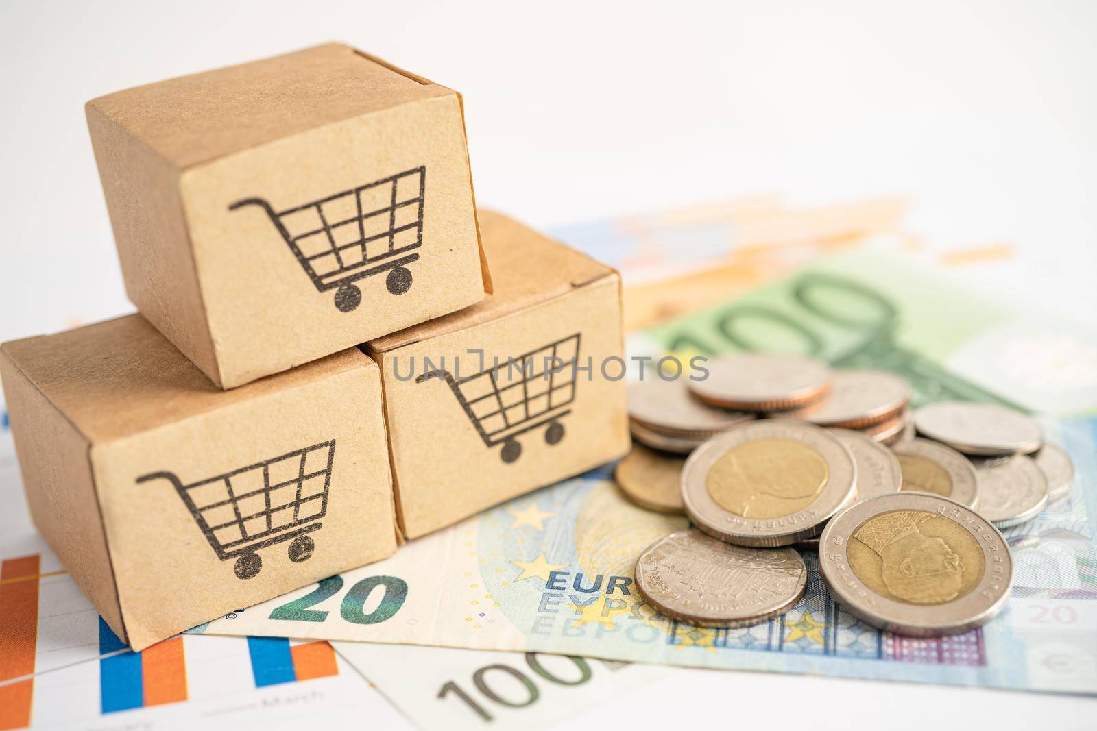 Shopping cart logo on box with US dollar banknotes, Banking Account, Investment Analytic research data economy, trading, Business import export online company concept. by pamai