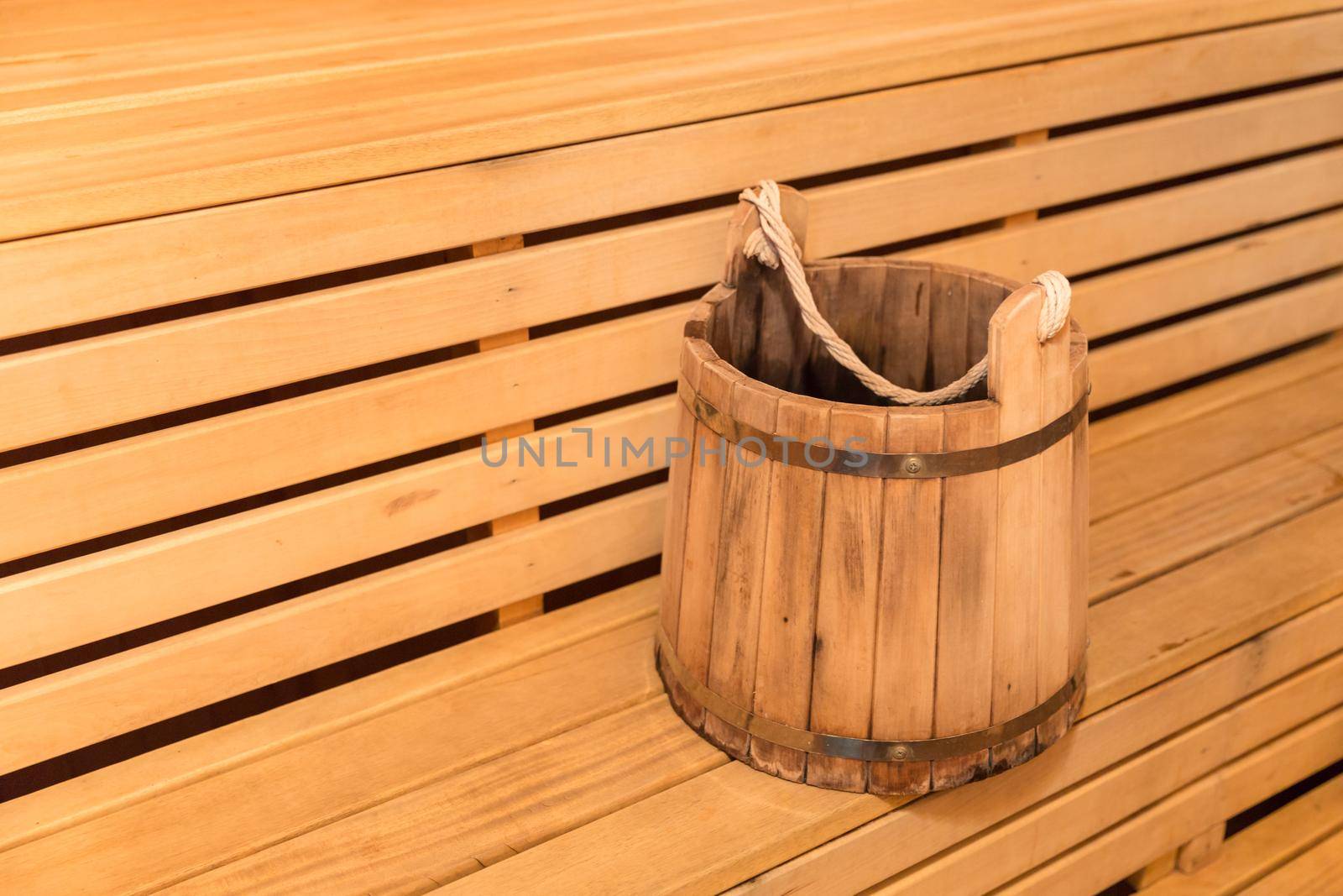 Inside view of traditional sauna with some equipment