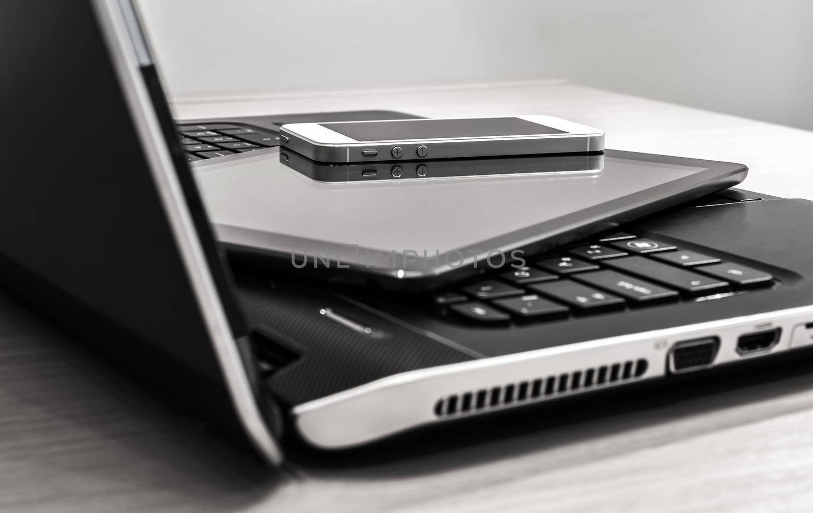 Modern electronic devices - laptop, tablet and telephone