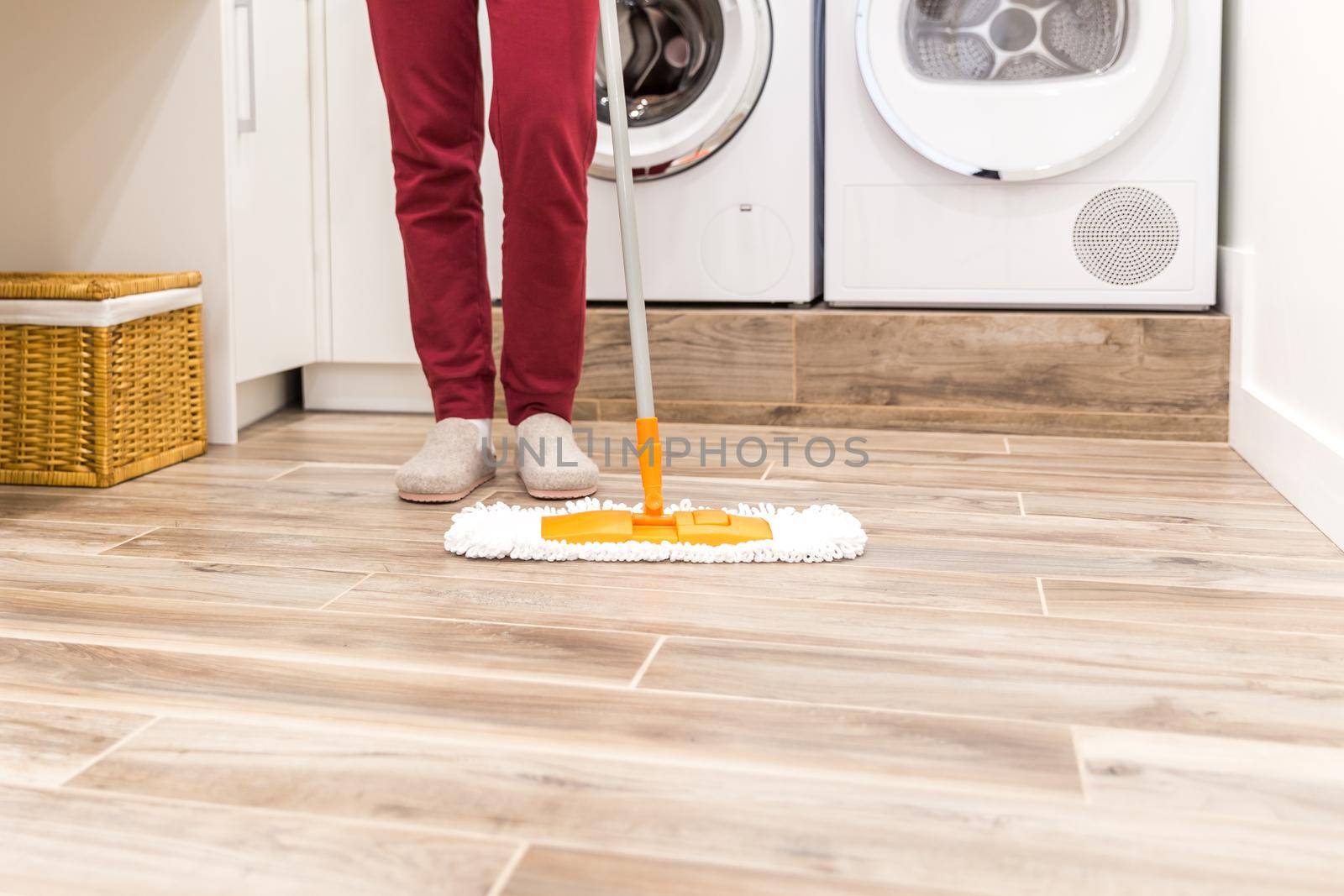 Cleaning floor in laundry room