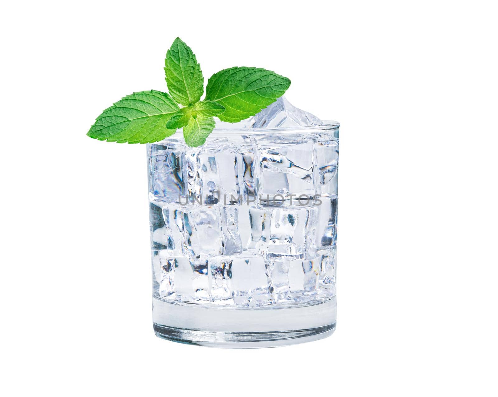 Glass of ice cubes cold water with fresh mint leaves for drink in summer. by pamai