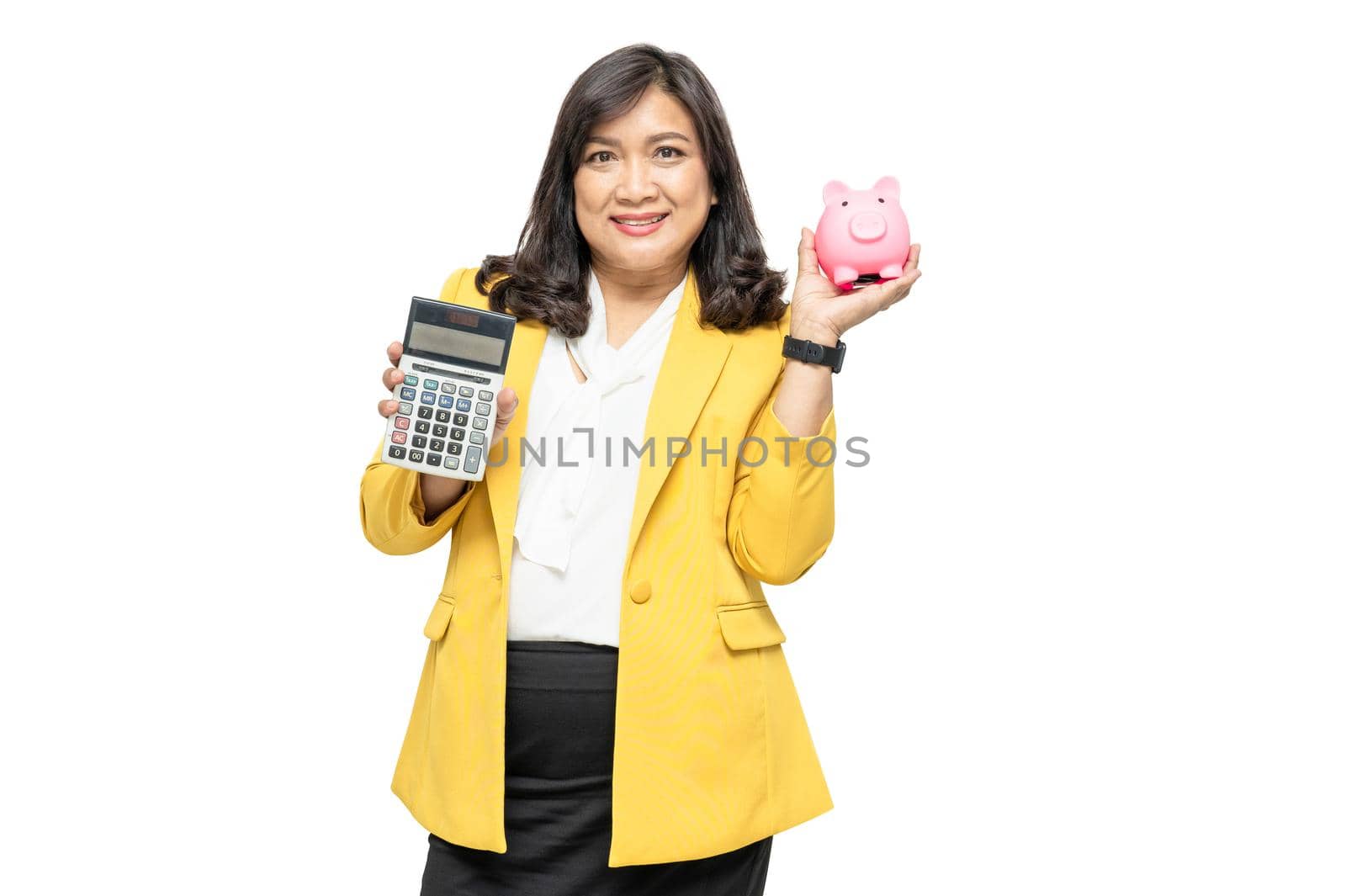 Business asian lady people in yellow suit holding calculator and piggy bank isolated on white background; finance economy banking saving concept.